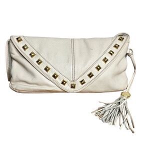 Vince Camuto ivory pebbled leather studded tassel shoulder bag